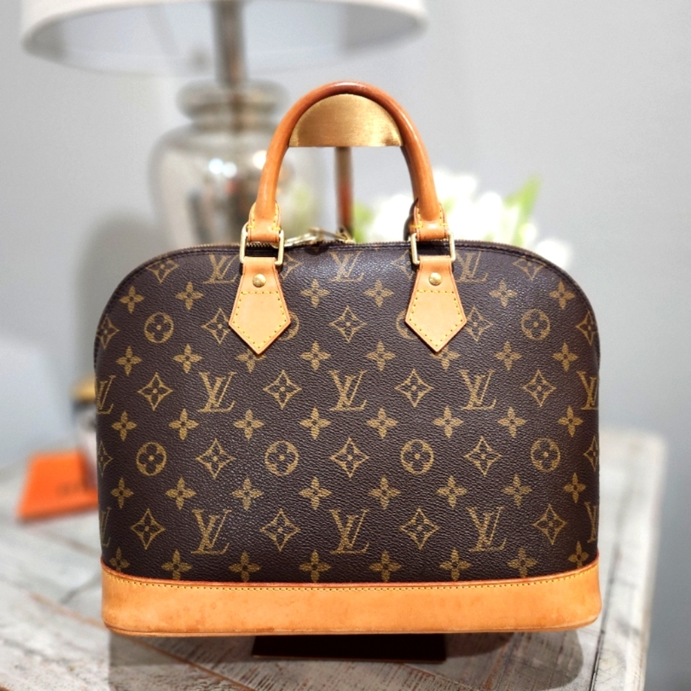Louis Vuitton Alma Monogram Handbag